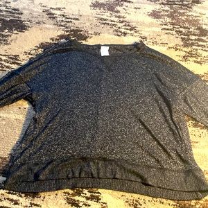 Black size medium long sleeved shirt.